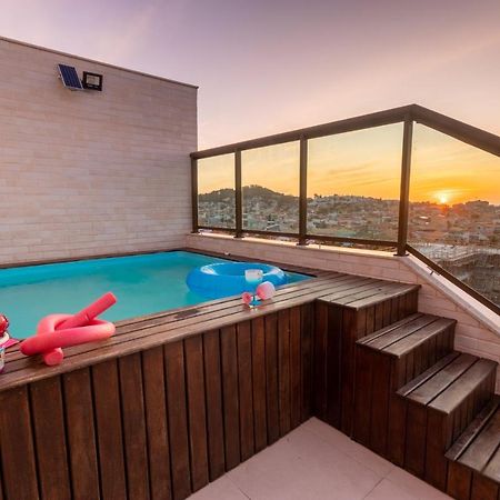 Cobertura Pé na Areia com piscina privativa - Praia dos Anjos Arraial do Cabo Esterno foto
