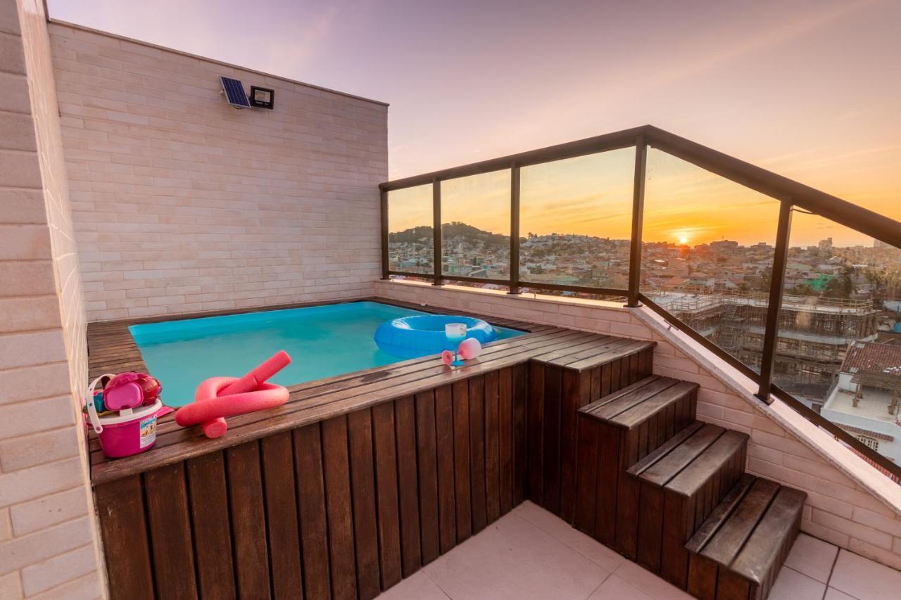 Cobertura Pé na Areia com piscina privativa - Praia dos Anjos Arraial do Cabo Esterno foto